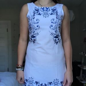 A white dress with blue designing